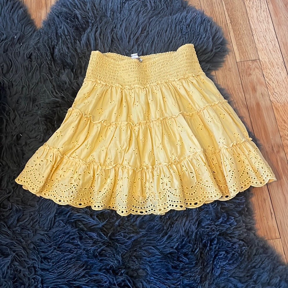 Extra small yellow skirt.